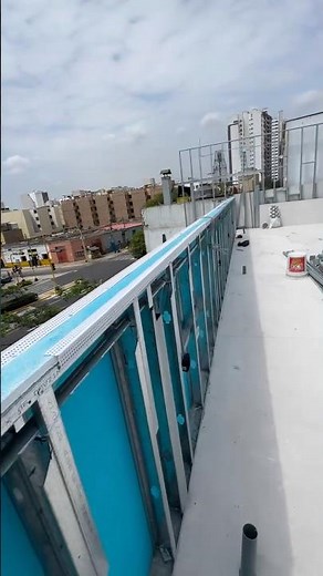 Parapet or drywall wall at medium height