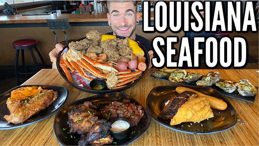 Southern food is the best food! Louisiana offers fresh seafood & Cajun cooking. Today we are Baton Rouge LA eating some comfort food from the scratch kitchen at Boil & Roux! We have turkey winds, candied yams, crab legs, turkey necks, oysters, smoked wings, catfish and so many more delicious American food items! | Joel Hansen - Model Vs Food