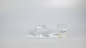 Demonstration Of Sugar Dissolving In Water Stock Footage SBV-352406425 - Storyblocks
