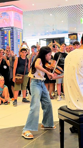 13M views · 584K reactions | A 10-year old violin prodigy plays Vivaldi Summer with me and SHOCKS the whole Airport  (with Yeonah Kim) | Julien Cohen Pianist | Facebook