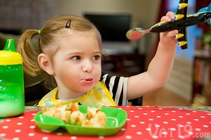 JetBib Illuminated Baby Bib: Features airplane spoon and light-up bib.