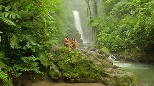 Aerial: Beautiful Young Women in Bikini in Jungle