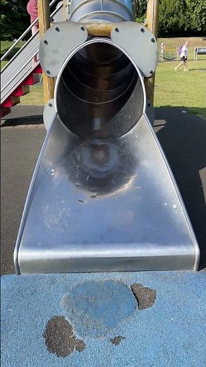 Toddler Tumbles Down Playground Slide Landing