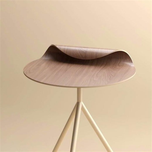 The designer created a table that literally went in a wave.