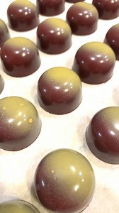 Continuing the fall line up: Ginger Cranberry. They will be available for the remainder of November and all of December. The filling includes a tart cranberry caramel topped with a ginger white chocolate ganache. First opportunity to grab these is @grannysatticcraftshow on Saturday 11/22. Get your tickets now! #elmchocolates #chocolates #bonbons #middletownnj | Elm Chocolates