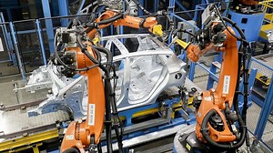 Ford’s ever-smarter robots are speeding up the assembly line