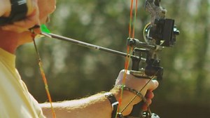 clip-3699905-slow-motion-shot-archer-firing-arrow-his