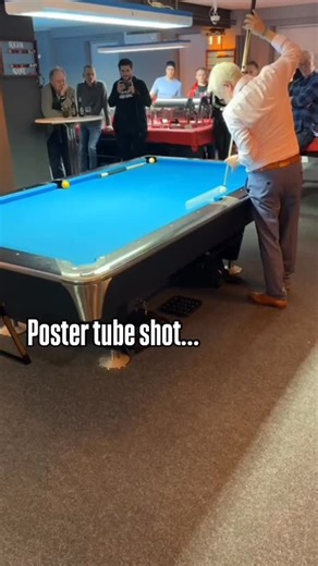 Ralph G. Eckert on Instagram: "Almost exactly 1 year ago live in the city of Düsseldorf in Germany. I like this poster tube shot, but I’m not sure who invented it or had the idea first? It just came up in one of the artistic pool programs. And did you recognize? The cue button under the rail was just for decoration…😅😅😬😇😇😇😎😎😎 #billiards #poolbilliard #eckertshots #trickshot Place: Düsseldorf, Germany Ralphs cue: @arthurqueue Tip & chalk: @kamui_brand Music: @the_jedi_baritone"