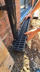 ACO Channel drains getting done ⚒️⚒️ High on the damp so there's a 130mm ACO to help eliminate damp 🙌 #landscaping #channel #drain #water #management #howto #tips #diy #fyp #fypage #fyppppppppppppppppppppppp | LNC Landscapes and Paving