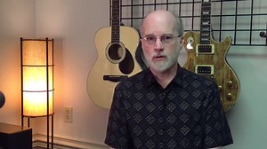 Should I choose a nylon or steel string guitar?