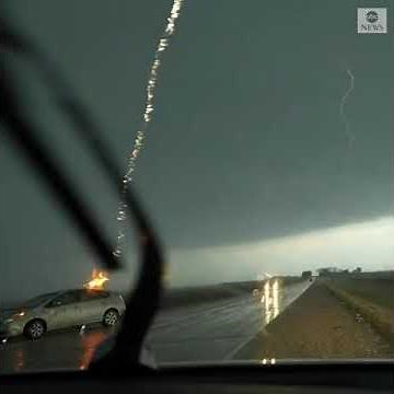 Storm chaser captures moment lightning strikes car in Iowa