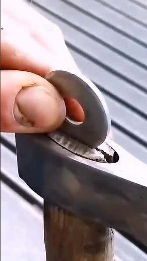 Securing a Steel Ax Head on a Wooden Handle.