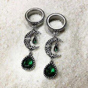 13K views · 152 reactions | Moon Dangle Plugs ✨ Shop all our available sizes here  https://www.bodycandy.com/products/green-gem-crescent-moon-dangle-screw-fit-tunnel-plug-set | Body Candy Body Jewelry | Facebook