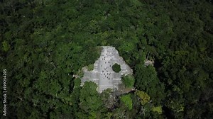 Aerial video flying towards the mayan Calakmul Temple in the Mexican Yucatan. The mayan ruins at Calakmul, Mexico