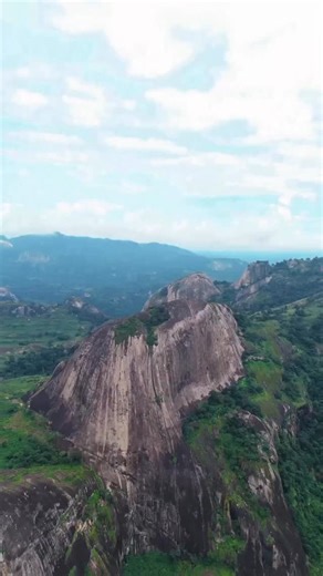 Some places don’t just rise from the earth; they rise from memory. Idanre Hill stands tall in Ondo, holding centuries of footsteps, stories and quiet echoes of a people who once lived upon its heights. Climbing its ancient steps feels like walking through time, where rock, sky and culture meet in one timeless breath. A beautiful reminder that Nigeria’s heritage is written not only in books but in the landscapes that watch over us. Video credit: @iamcollinsnkem #TourNigeria #IdanreHill #OndoState