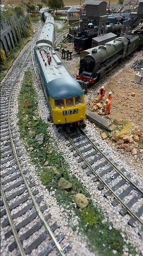 Class 85 pulling a passenger train up the incline.