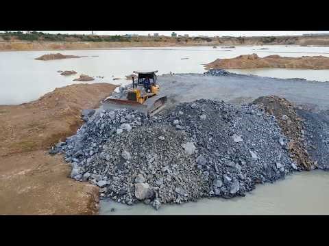 The Mission is Build Road Restrict Land Boundaries in Deep Pit Use Bulldozer Dump Truck In Operation