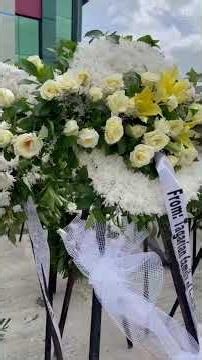 Filipinos from around the country, abroad offer flowers for Rene Baterbonia