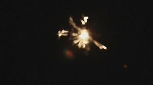 Sparkler out of focus - Free Stock Video