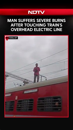 Madhya Pradesh News | Man Suffers Severe Burns After Touching Train's Overhead Electric Line: Video