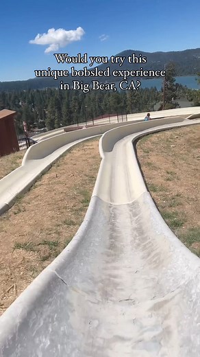 Rise and slide! 🛝 Head to Alpine Slide at Magic Mountain to steer your sled down a concrete course of high-banked turns and straightaways. 😮 The bobsled-like adventure starts with a scenic chairlift ride that showcases Big Bear Lake and surrounding mountains. ⛰️ Then choose between a faster race track or a slower, more leisurely one, and cruise to the bottom​. Learn more about this destination: https://bit.ly/4dnqUvq 📍Visit Big Bear 📷 @suzie.loves.life on IG 🎵@fiehfiehfieh, @unitedmasters |