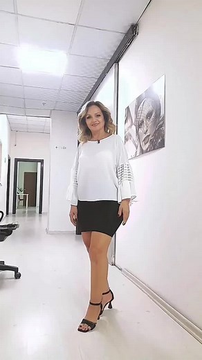 Elegant Office Fashion: White Blouse and Black Skirt