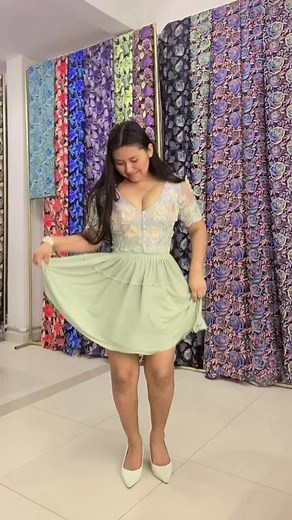 Floral Dress Twirling Experience in a Trendy Store