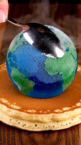 3.8K views · 14 reactions | Frozen planet earth being crushed on a pancake is so bizarre...  | Chef Gilburt | Facebook