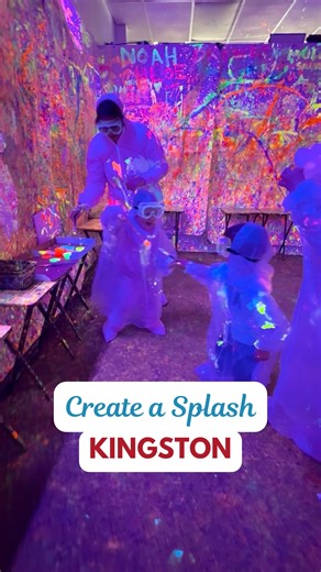 Community Kangaroo on Instagram: "We had the most unique play date at @createasplashcc in Kingston, MA! My kids and their buddies had 45 minutes in our own splash room to paint a canvas while neon, non-toxic paint glows under black lights. The kids (and adults!) were absolutely encouraged to go wild, and we did! The paint is washable, safe, and insanely fun. We wore play clothes and added ponchos for the kids and coveralls for the adults so we could get super messy! All ages welcome! Even my 2-y