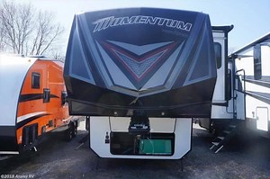 MASSIVE PRICE REDUCTION! Scoop up this beauty of a Toy Hauler for an amazing discounted price. Equipped with 3 slideouts and room to sleep the whole family. This is the perfect rig for taking your toys and your family out for an epic adventure. Get all the info and see more pics here -> https://bit.ly/2CUXhVb | RVUSA.com