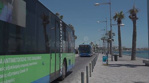 Cyprus. Pathos. 05/20/2021 Two Blue Buses Drive Along the Road Along the Sea in the City Center Stock Footage - Video of downtown, pathos: 241815698