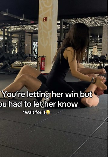 Freestyle Wrestling Fun: Gym Couple Playful Moments