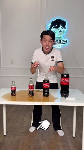 Trying the classic Coca-Cola Mentos challenge