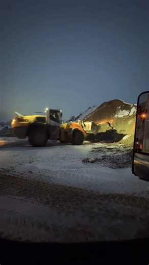 Loader loading B2 material