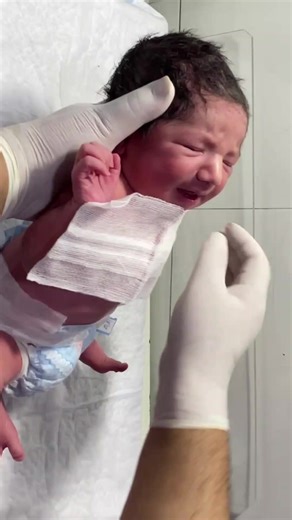Newborn's First Breath: A Heartwarming Moment