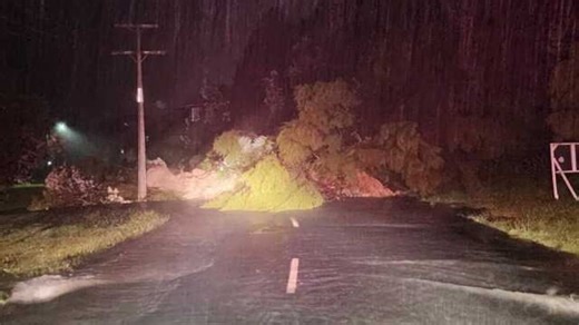 Weather: Tropical storm hits North Island, regions under red heavy rain warnings, man missing after car swept down Auckland river