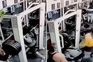 Horrifying moment woman crushed to death during workout in front of her daughter