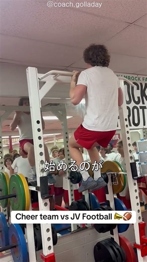 American football player and cheerleader pull-up contest