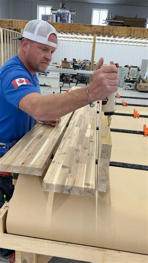 Dustin Mitchell on Instagram: "Gluing up one of the acacia wood butcher block workbench/tool wall tops with some @titebondproducts dark this time and more @festoolcanada dominos #woodwork #tools #work"