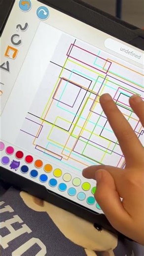 Use the rectangle tool and Scratch Jr colors to draw abstract art.