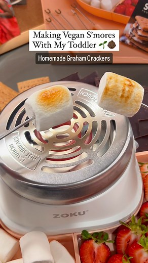 No campfire needed for these homemade vegan s'mores thanks to the ZOKU S'mores Maker Set. Craving this treat? Head over to @myblackgirlroots to find the full recipe! 🍫🔥🌱 #smores #smoresmaker #chocolate #marshmallow #veganrecipes #indoors #summertreats #snacksforkids | Zoku