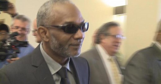 Scandal-tainted pastor banned from church