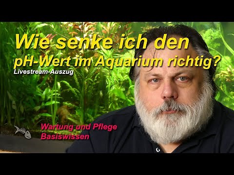 How do I properly lower the pH value in the aquarium with mineral acids.