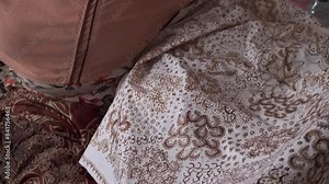 The technique of making batik by writing using a canting tool. Canting consists of nyamplung, cucuk, gagang or handles made of copper, bamboo and wax.