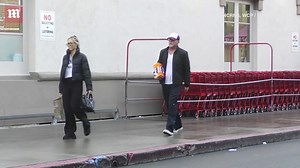 Miley Cyrus' mom Tish and her new beau Dominic Purcell shop for a Christmas tree