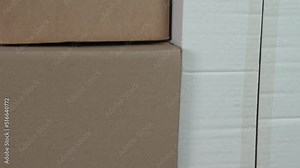 Cardboard delivery boxes. Brown and white shipping containers. Paper trash for recycling