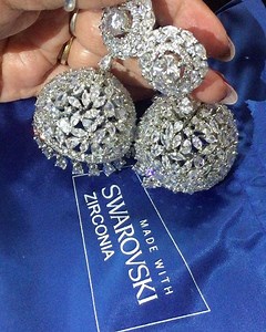 3.9K views · 16 reactions | First time bought to you 360 revolving Jhumki amazing and unique design original swarovski stones rhodium plating high end piece ping now 8826689946. #replica #woman #diamond #jewelry #jewellery #swarovski #beautiful #girl #artificial #bollywood #high #society6 #diamond #womanfashion #luxury #fashionjewelry #fashion #indianjewelry #handmadejewelry | Swar Jewels | Facebook