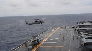 4.7K views · 690 reactions | Sailors assigned to the forward-deployed amphibious assault ship USS America (LHA 6) conduct flight operations with the 31st Marine Expeditionary Unit (MEU), Marine Medium Tiltrotor Squadron (VMM) 262 (Reinforced) in the Phillipine Sea. | U.S. 7th Fleet | Facebook
