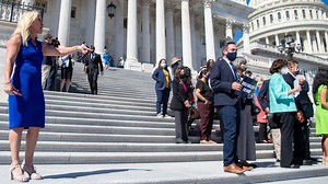 Greene heckles Democrats and they fire back on Capitol steps