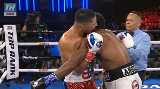 Edgar Berlanga tries to bite Alexis Angulo's ear mid fight